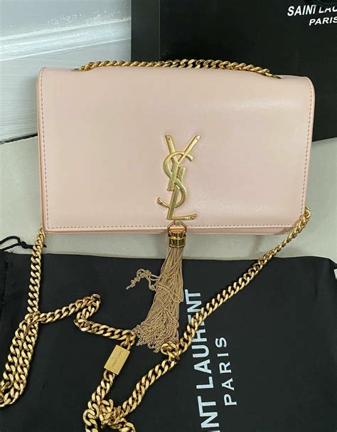 ysl clutch bag with tassel price|ysl handbags with tassel.